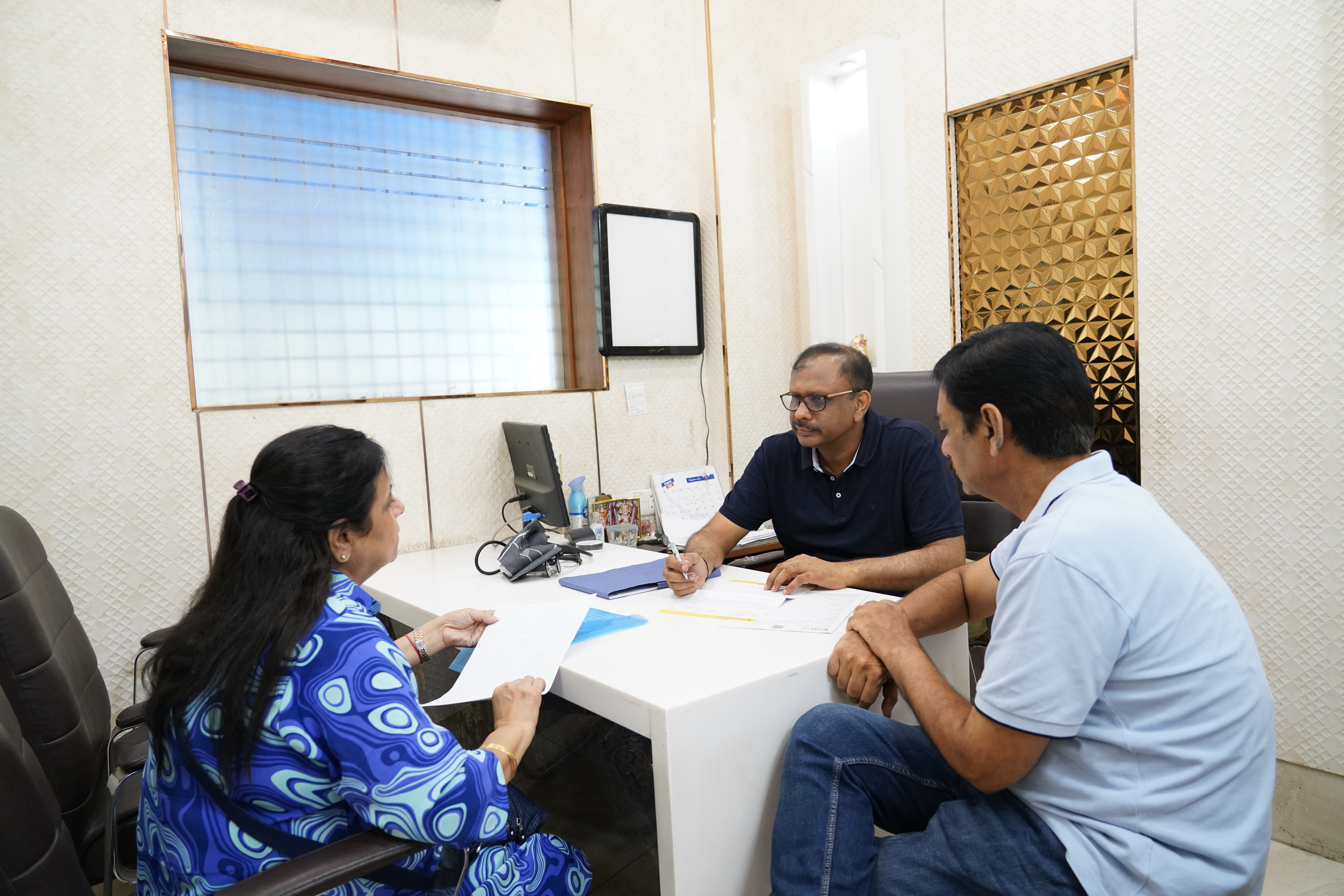 Dr. Ajay Aggarwal with a patient